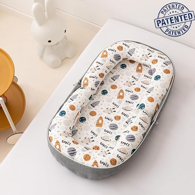 Baby Lounger, Foldable Infant Nest with Soft Memory Foam Mat, Cover with Adorable Pattern, Converts to Backpack for Easy Travel, 0-12 Months, Rocket
